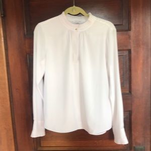 White Calvin Klein blouse with pleated details